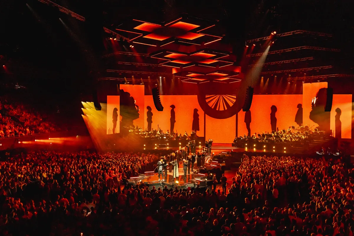 ZO! Gospel Choir with orchestra in front of a full Ziggo Dome